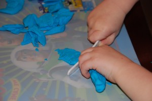 Cutting Playdough with a Plastic Knife