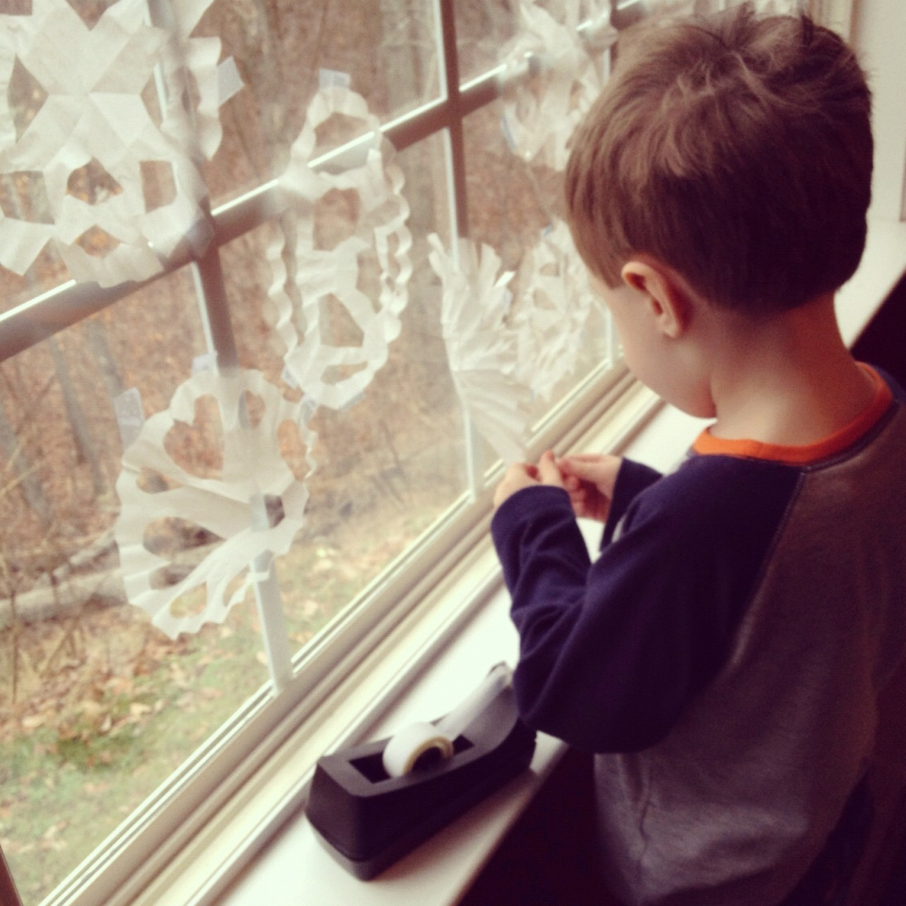 Taping Coffee Filter Snowflakes