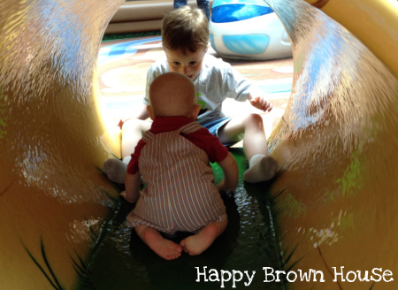brothers in a tunnel Happy Brown House