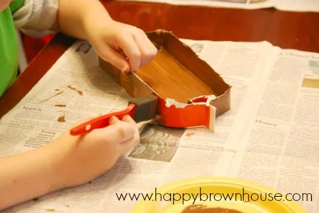 Make a viking boat from a recycled orange juice carton