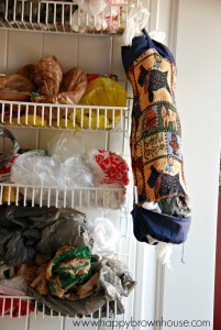 contain plastic bag clutter by sewing a plastic grocery bag holder for your pantry