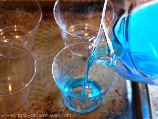 pouring jello for candy shark jello snacks