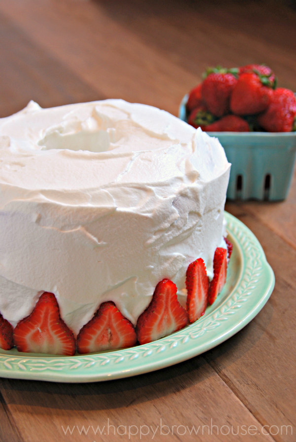 Strawberry Shortcake Ice Cream Cake with strawberries and whipped cream topping