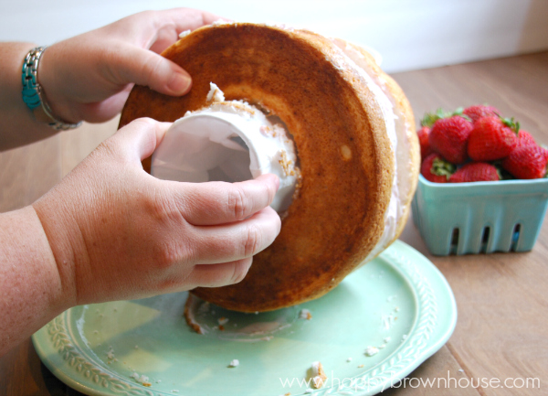 removing cup from ice cream cake