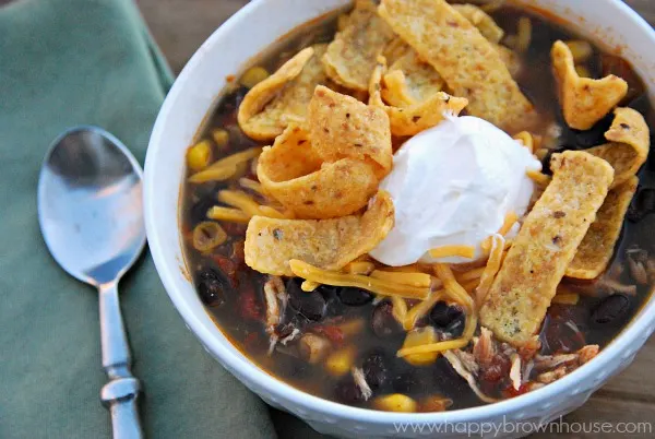 Need a quick dinner to throw in the crockpot? This Crockpot Chicken Tortilla Soup will warm up even the coldest winter day. Using basic ingredients, slow cooker lovers will love the time they save with this easy crockpot dinner idea. Use frozen chicken breasts and you don't even have to remember to thaw chicken the night before!
