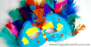 These Paper Plate Carnival Masks are perfect for teaching kids about Rio Carnival, Brazil, and the Rainforest. During a study of the rainforest, read about Rio Carnival in Brazil and make your own colorful masks. Then, have your own family fun night of making colorful, feather-filled Carnival masks and watching the Carnival themed movie for kids, Rio.
