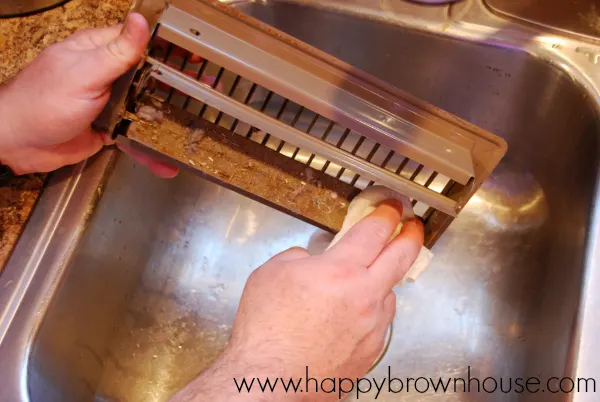 Organizing and Spring Cleaning the Laundry Room - Happy Brown House