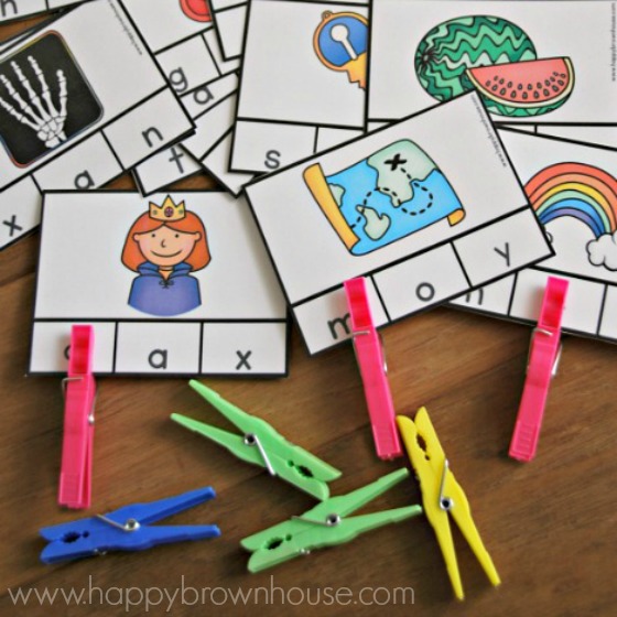 close up of printable Alphabet Beginning Sounds Clip cards and colorful clothespins