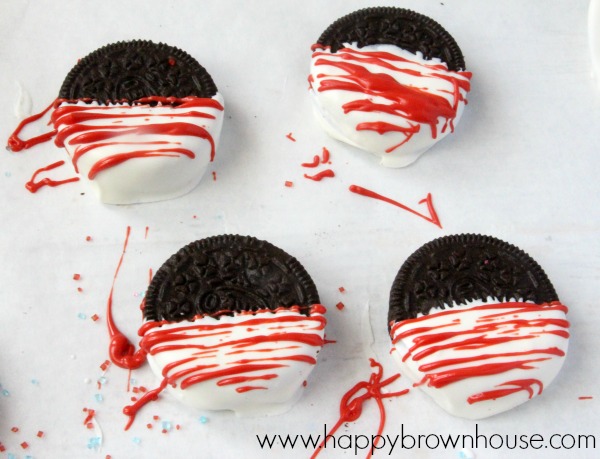Oreos with red candy coating stripes for Patriotic Oreos