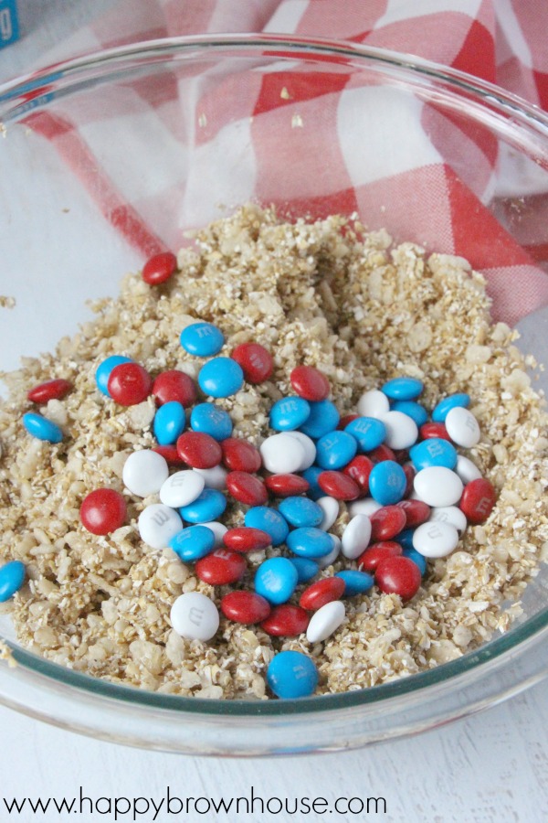 These Patriotic Granola Bars are the perfect treat for Memorial Day or the Fourth of July. Kids will love this easy treat and they'll be the hit of the barbecue. This is a perfect treat for kids to help with for your special celebration.