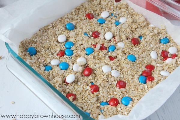 These Patriotic Granola Bars are the perfect treat for Memorial Day or the Fourth of July. Kids will love this easy treat and they'll be the hit of the barbecue. This is a perfect treat for kids to help with for your special celebration.