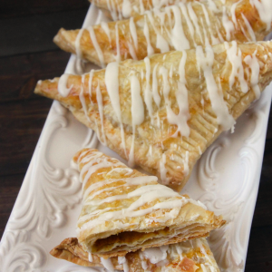 These easy Pumpkin Turnovers will be the hit of the fall party or Thanksgiving. If you love pumpkin, these are the flakiest, mouthwatering turnovers. They are surprisingly easy to make and will have you begging for more. These work well for a dessert or a breakfast pastry.