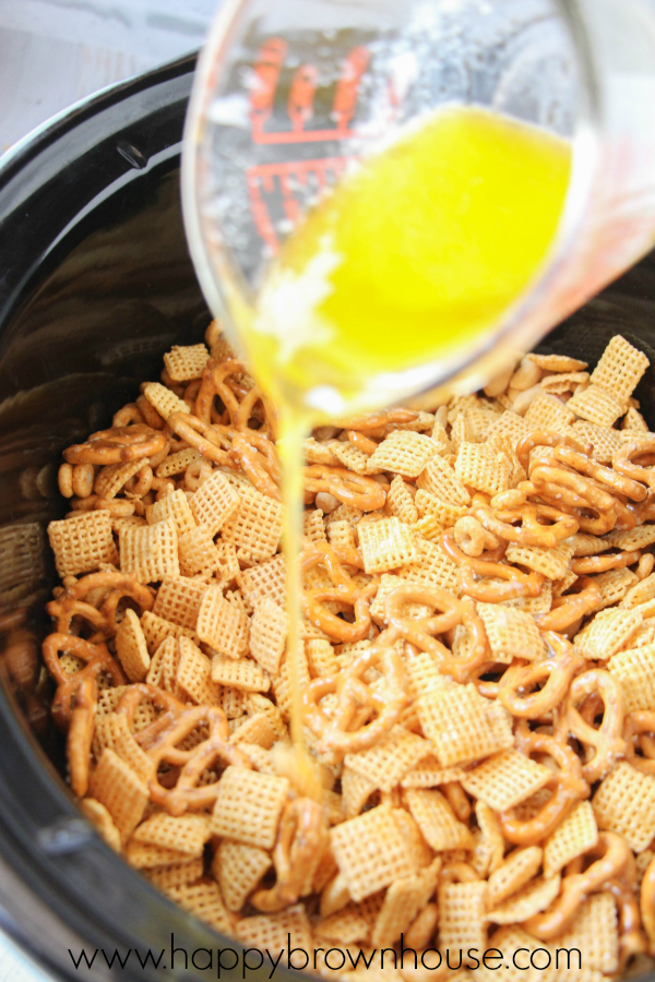 This Crockpot Chex Mix Recipe is the perfect mixture of salty and sweet. Easy to make for a chex mix snack or for a party or an special neighbor gift. 