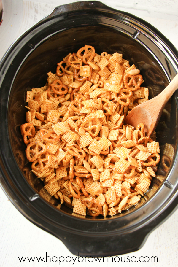 This Crockpot Chex Mix Recipe is the perfect mixture of salty and sweet. Easy to make for a chex mix snack or for a party or an special neighbor gift. 