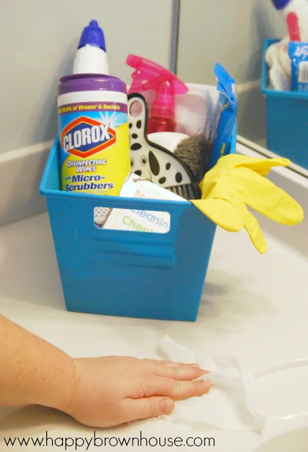 This Bathroom Cleaning Kit for Kids includes everything needed to clean the bathroom, including a Free Printable Bathroom Cleaning Checklist and flippable chore cards. This simple DIY tip will help kids clean the bathroom and lower mom's nagging. What a lifesaver!