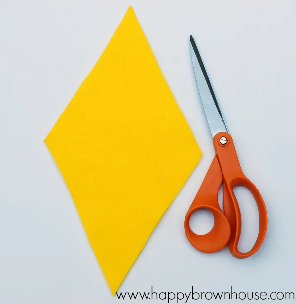 yellow felt rhombus shape for the kite in the Kite Bow Counting Busy Bag