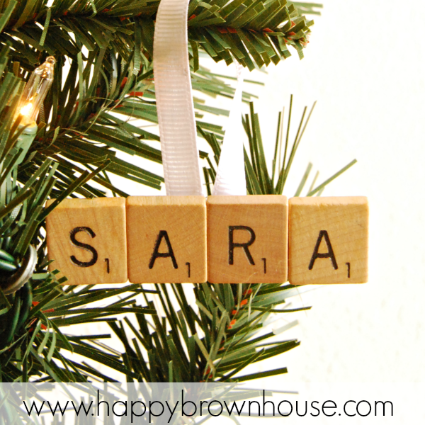 close up of Scrabble Tile Name Ornament hanging on a Christmas tree branch