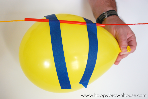 Watch this balloon rocket zoom across the room in this balloon science experiment. This is a great stem activity for kids.