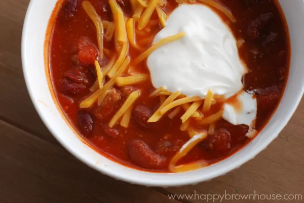 This Crockpot Chili recipe is so good and super easy to whip up. It's perfect for cold nights! Make a big batch of this slow cooker chili before the guys come over to watch football or make it for a family meal. Either way just make it! 