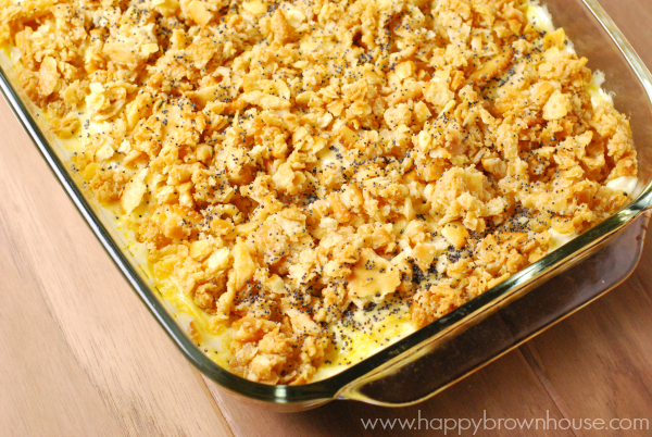 close up of chicken casserole topped with Ritz crackers and poppy seeds 