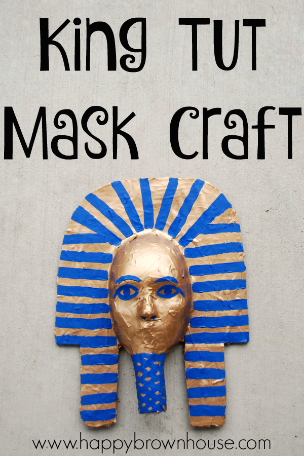 paper mache King Tut Mask craft made by kids, gold paint with blue paint details