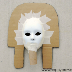 attached cardboard roll to make chin piece of King Tut mask