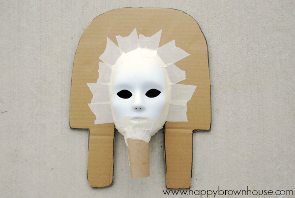 attached cardboard roll to make chin piece of King Tut mask