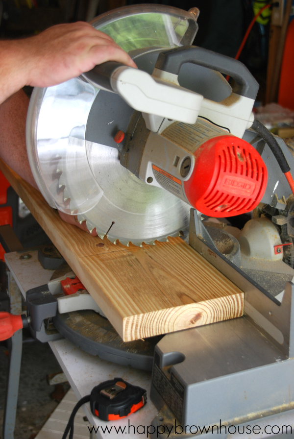 Saw cutting wood for a wooden block play town for pretend play