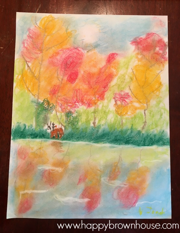 Completed chalk drawing of a fall trees, a deer, and a pond reflection made by a child using The You Are an Artist Chalk Pastel drawing tutorials for an online homeschool art class