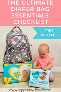 Baby in pink outfit with Pampers diaper box, wipes, and diaper bag